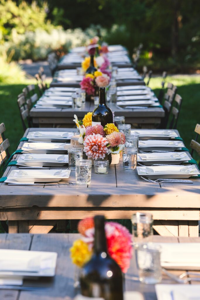 Table Setting Diners pour wine at Pure Mendocino
